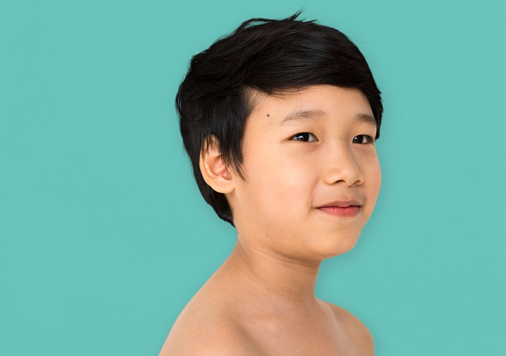 Asian ethnicity boy is in a shoot