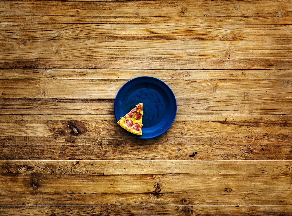 Last Slice of Pizza on Blue Plate