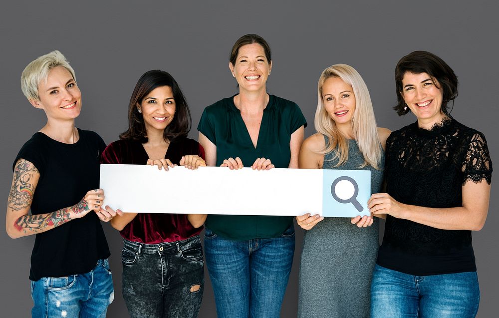Group of women smiling and hodling search blank banner