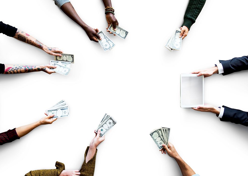 Hands of people holding dollar banknote for investment