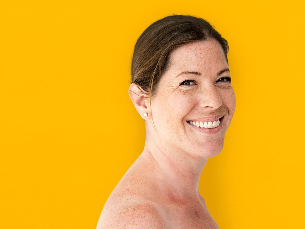 Happiness woman bare chest topless smiling studio portrait