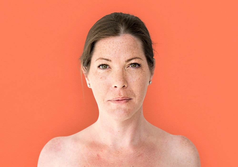 Woman bare chest topless studio portrait