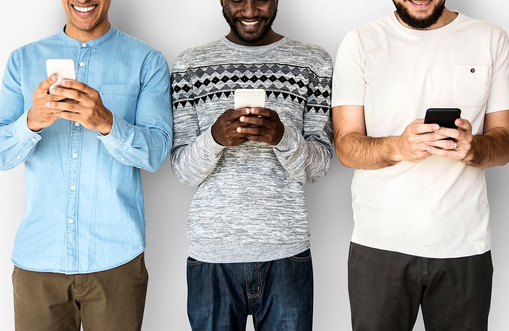 Happiness group of men smiling and conneted by mobile phone
