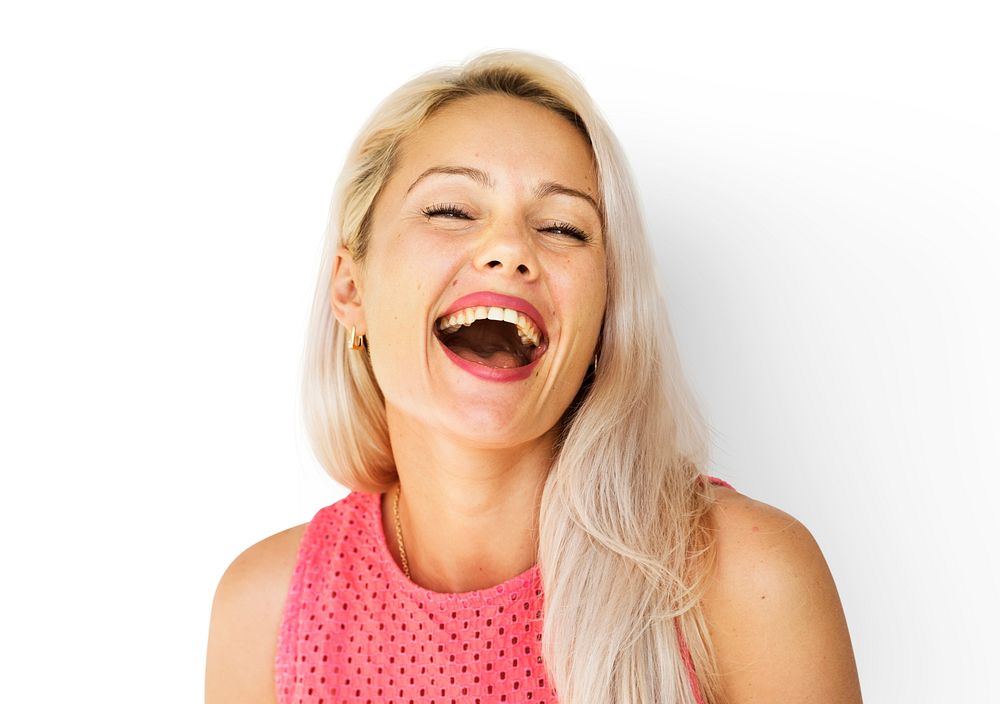 Caucasian woman face expression laughing and smiling