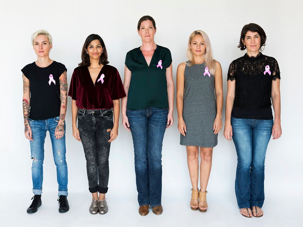 Group of Diverse People with Pink Represent Ribbon Breast Cancer Awareness