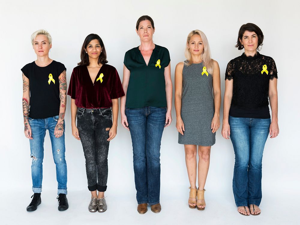 Group of Diverse People with Yellow Ribbon Represent  Sarcoma Cancer