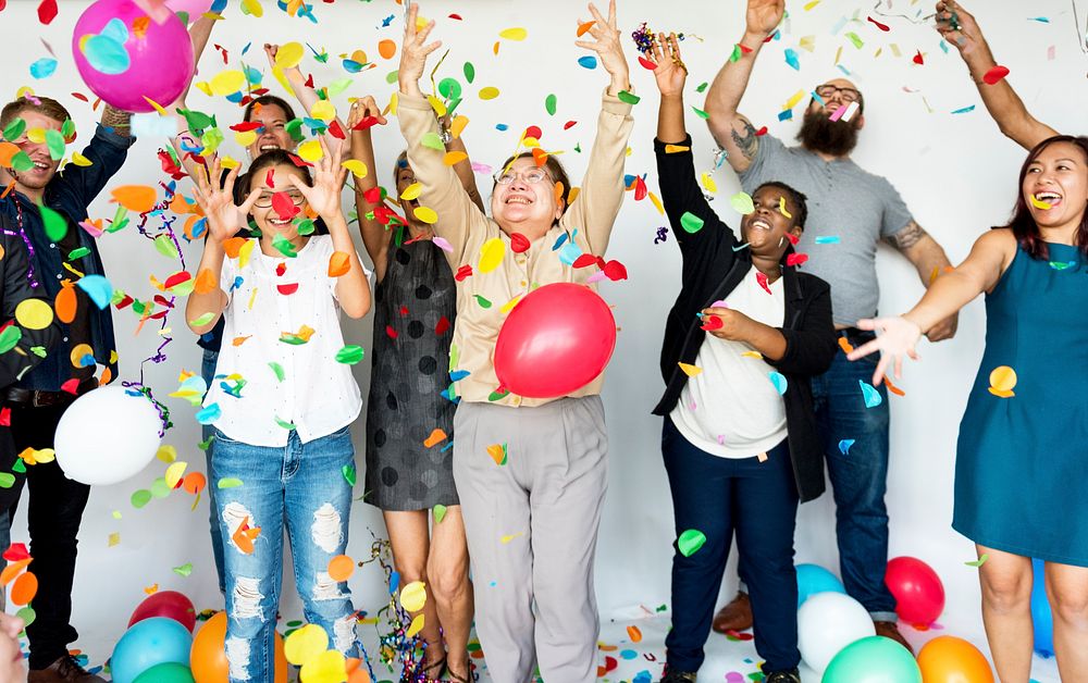 Group of Diverse People with Party Balloons Confetti
