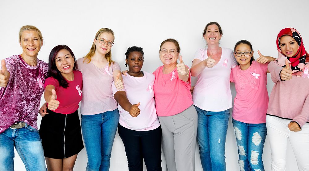 Group of Multiethnic Women Wear Pink Shirt and Pink Ribbon