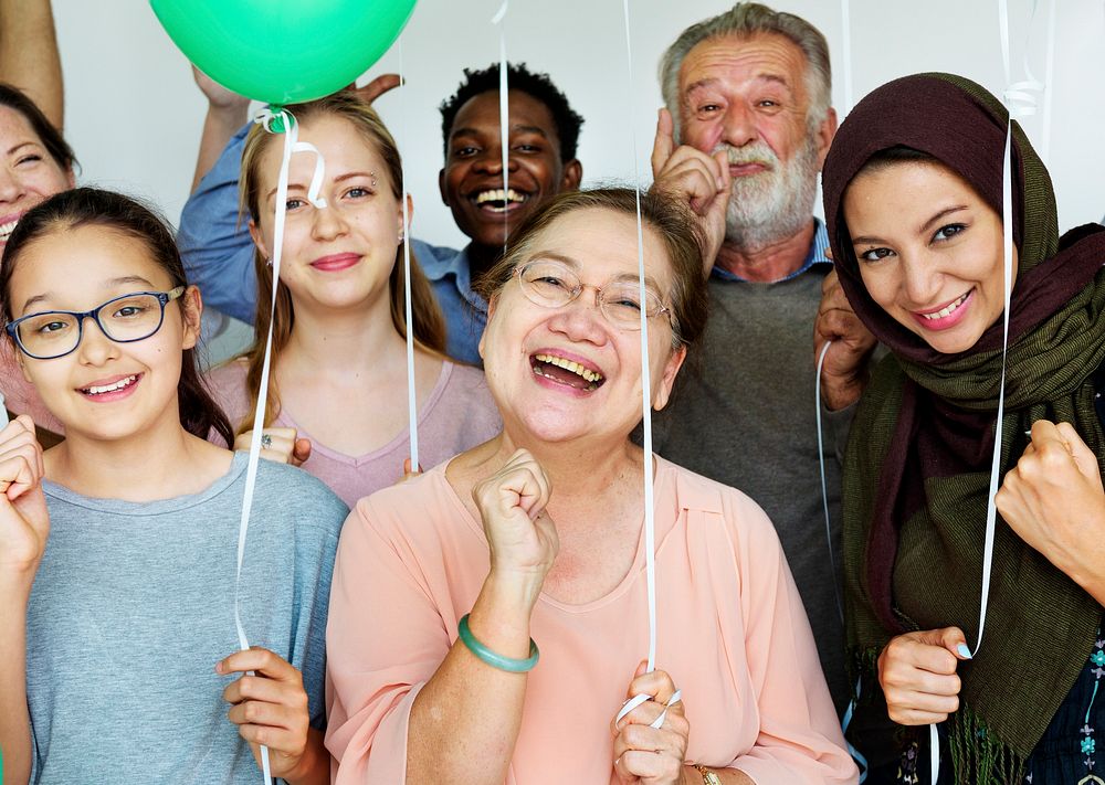 Diverse group of happiness people celebration with balloons