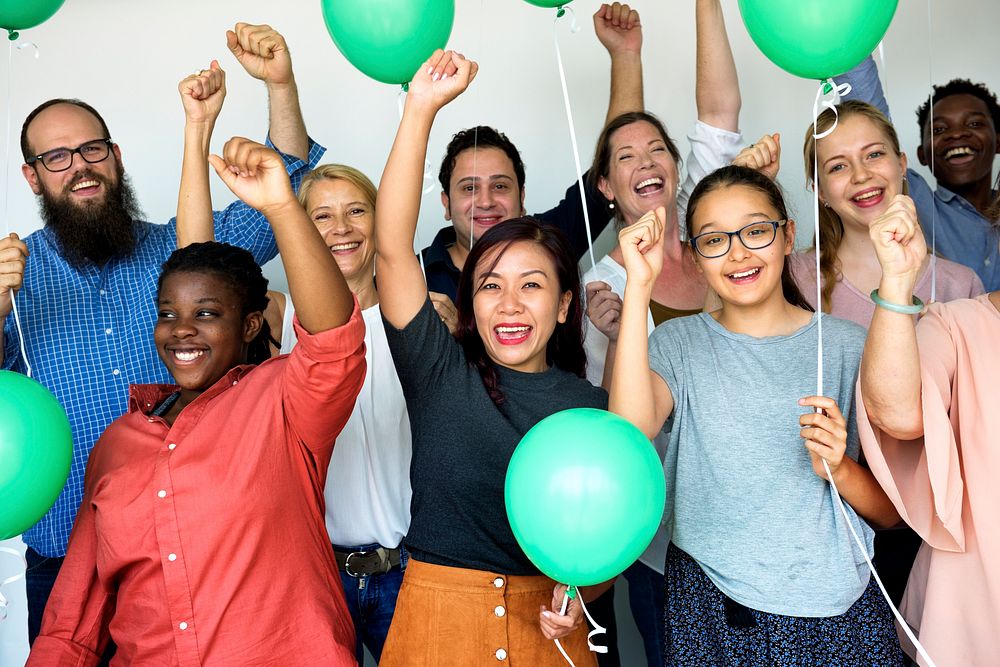 Diverse group of happiness people celebration with balloons