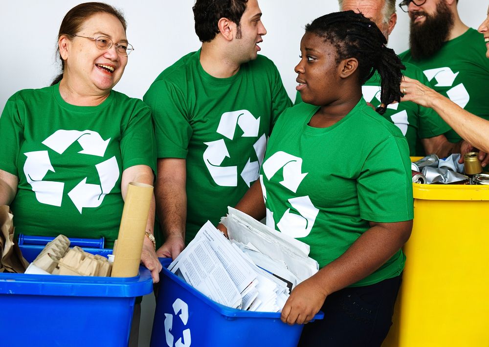 People caring for the environment by recycling
