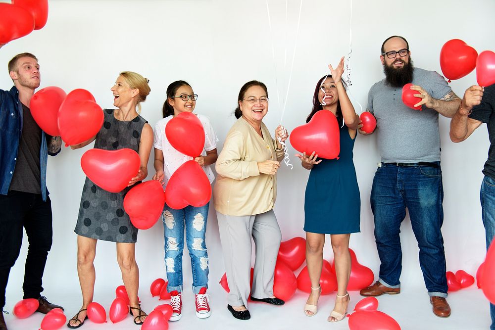 Happiness group of people with love heart shape balloon