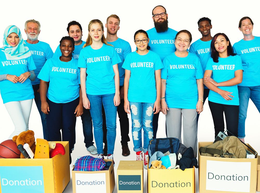 Group of volunteer people donate stuff for charity