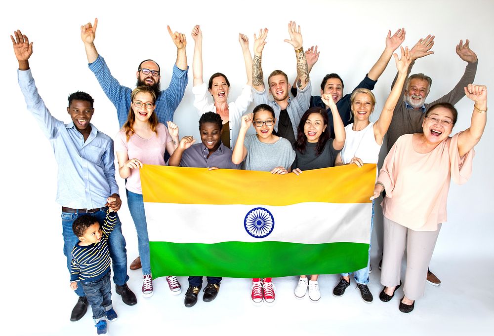 Group of people holding indian flag studio portrait
