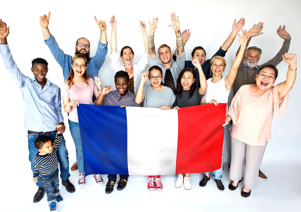 Group of people holding french flag studio portrait