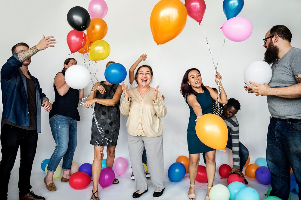 Group of Diverse People Holding Balloons Cheerful