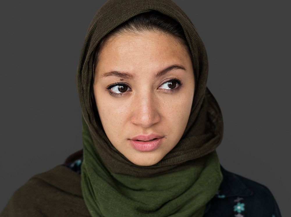 Portrait of a muslim woman with teary eyes