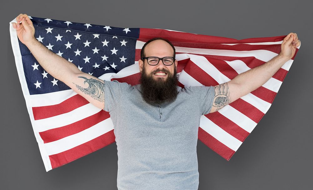 Man holding flag and posing for photoshoot