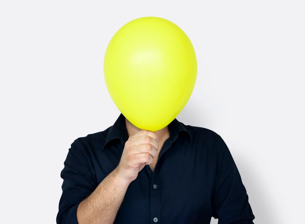People Faces Covered with Balloons