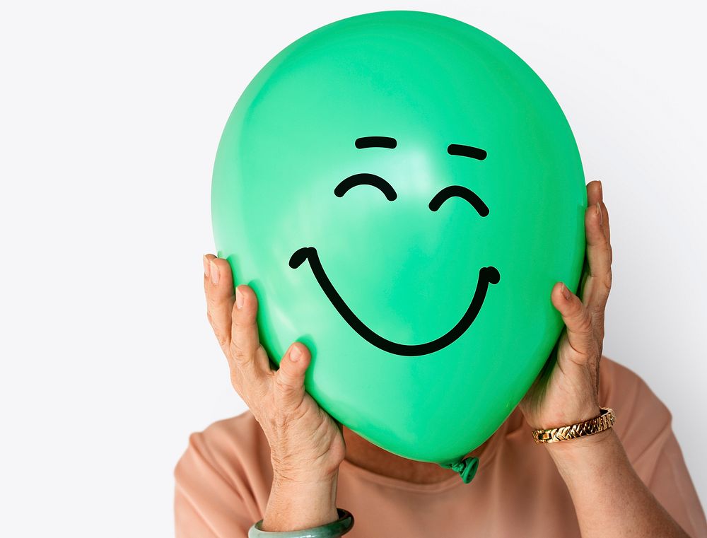 People Faces Covered with Happy Expression Emotion Balloons