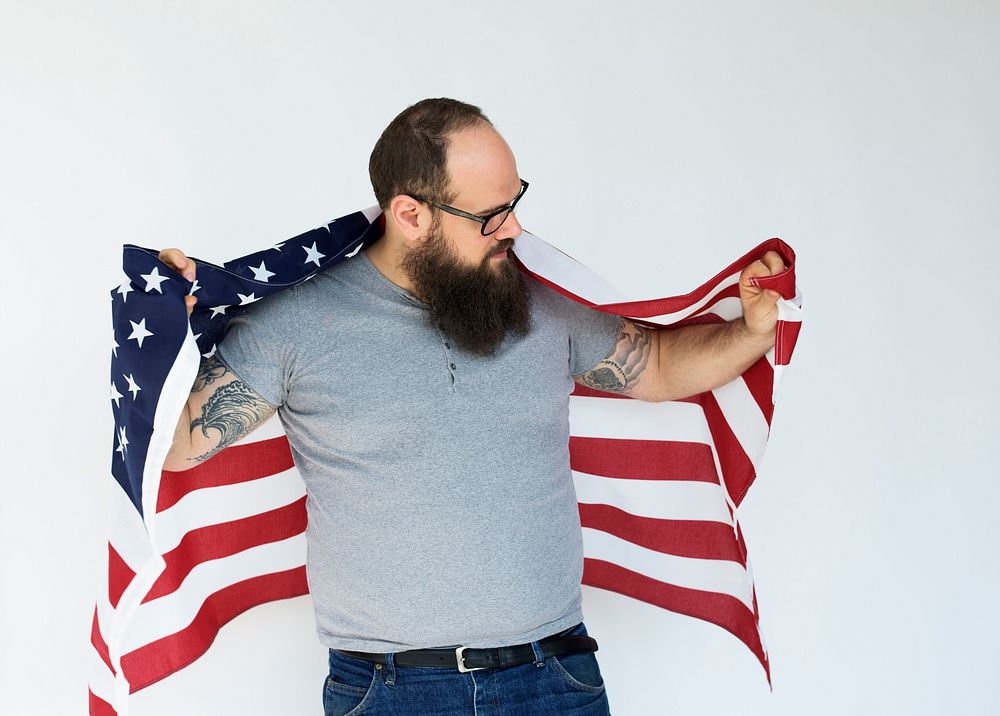 Adult Man Holding USA Nation Flag Studio Portrait