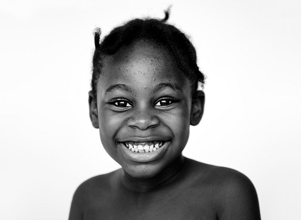 Portrait of young African girl on white background
