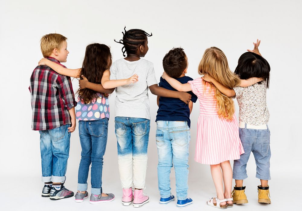 Group of school friends hugging together