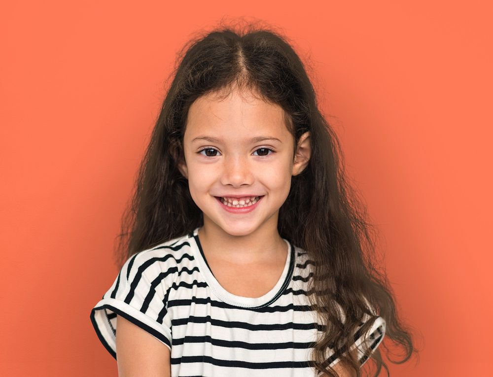 Little girl smiling casual studio portrait