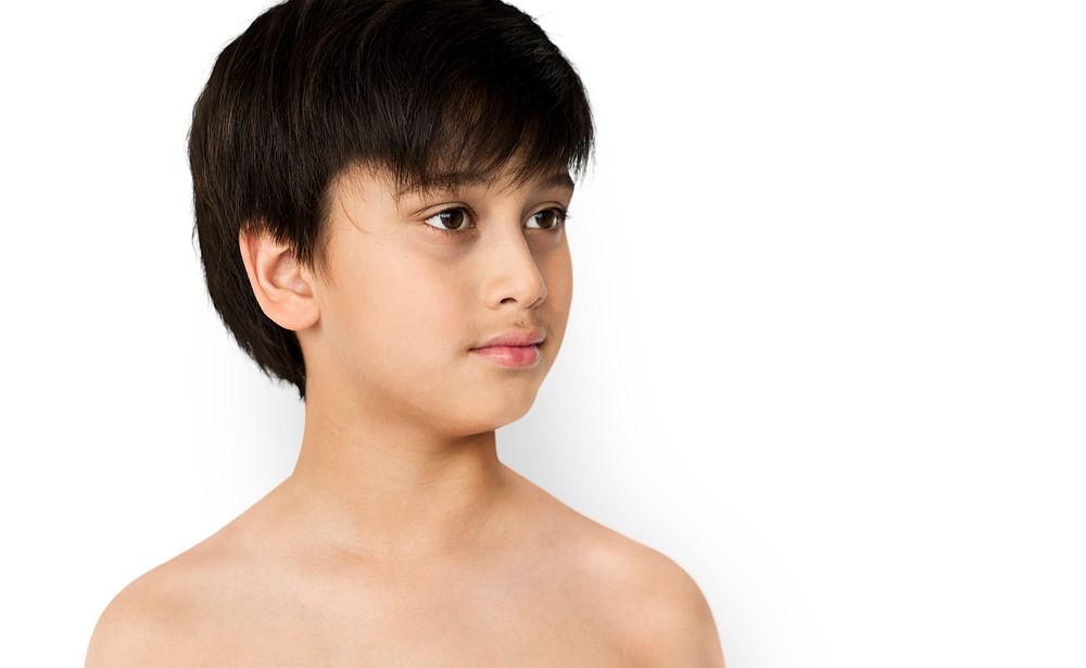 Young Boy with Serene Face Expression Studio Portrait