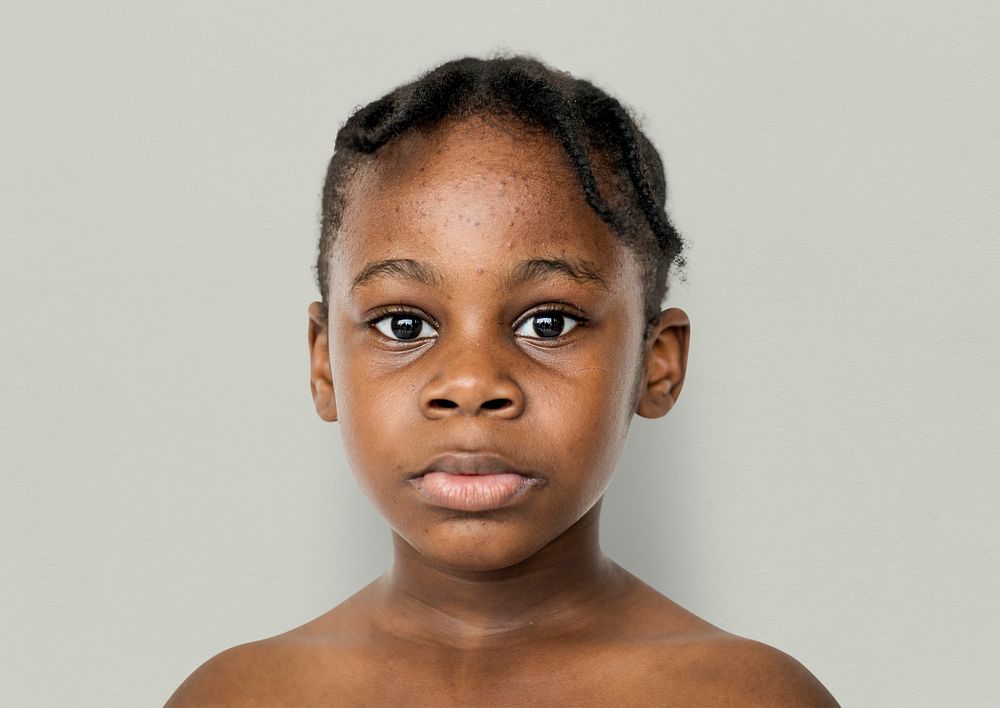 African kid portrait shoot with staring face