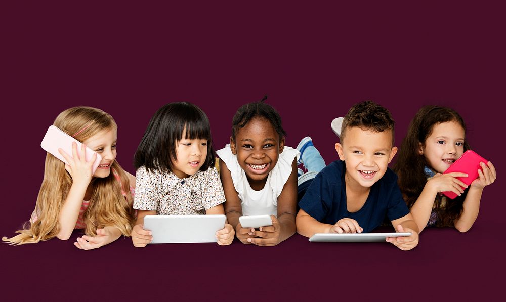 Diverse Group of Kids Using Electronic Devices