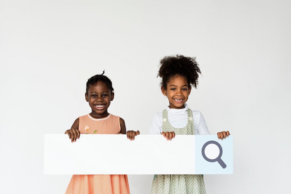 Kid holding search bar icon for studio shoot