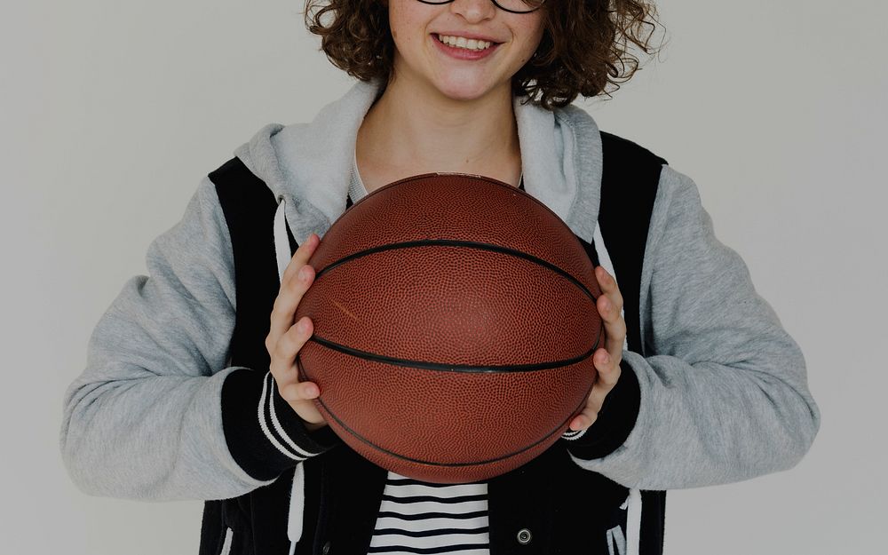 A Girl is Holding Basketball