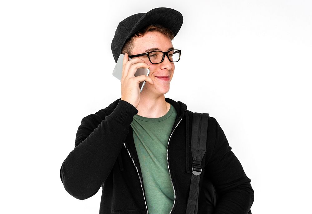 A Teenager Guy is using Smartphone Talking