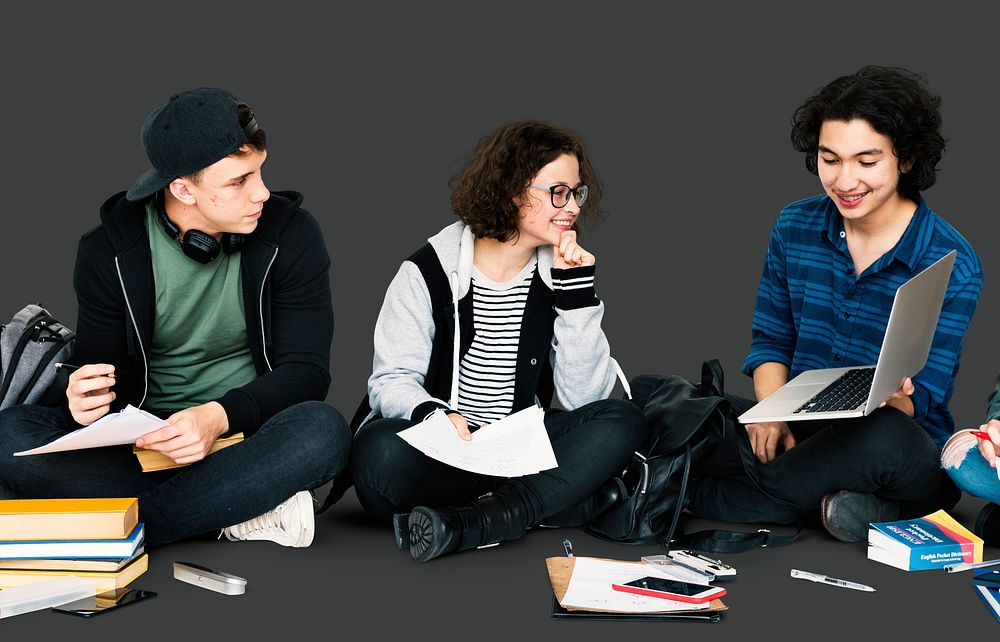 Diverse Group Of Students Sitting and Study