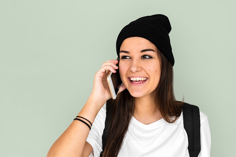 Woman talking mobile phone with smiling