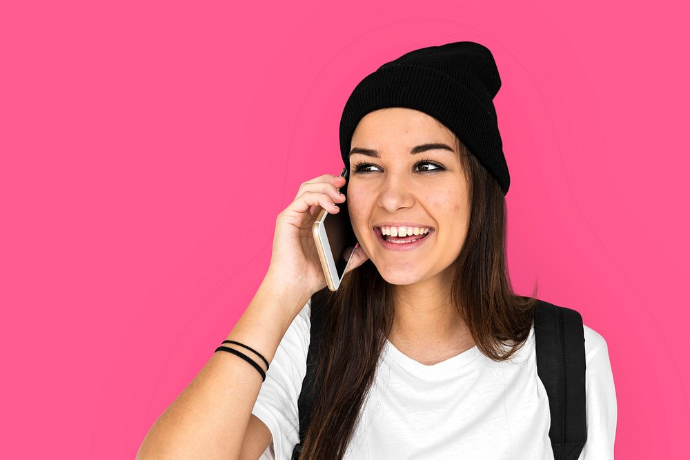 Woman talking mobile phone with smiling