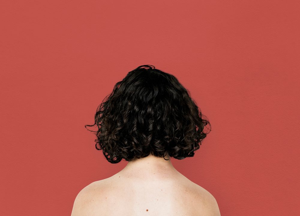 Young Adult Woman Back Topless Studio Portrait