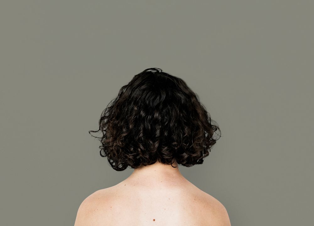 Young Adult Woman Back Topless Studio Portrait