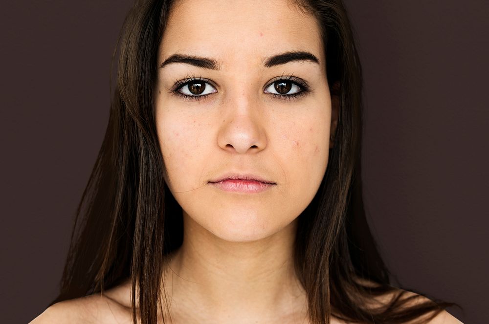 Young Adult Woman with Serene Face Studio Portrait