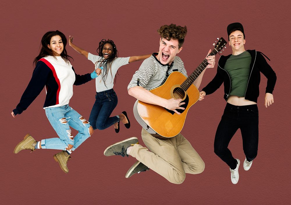 Young Adult People Jumping with Guitar Studio Portrait