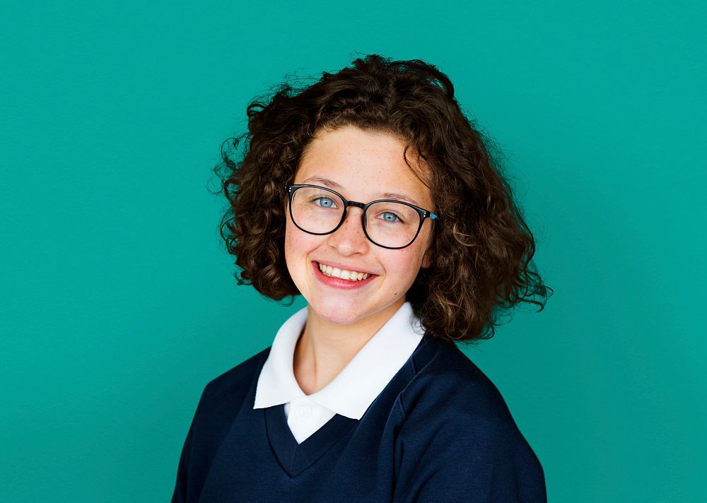 Young girl student smiling studio portrait