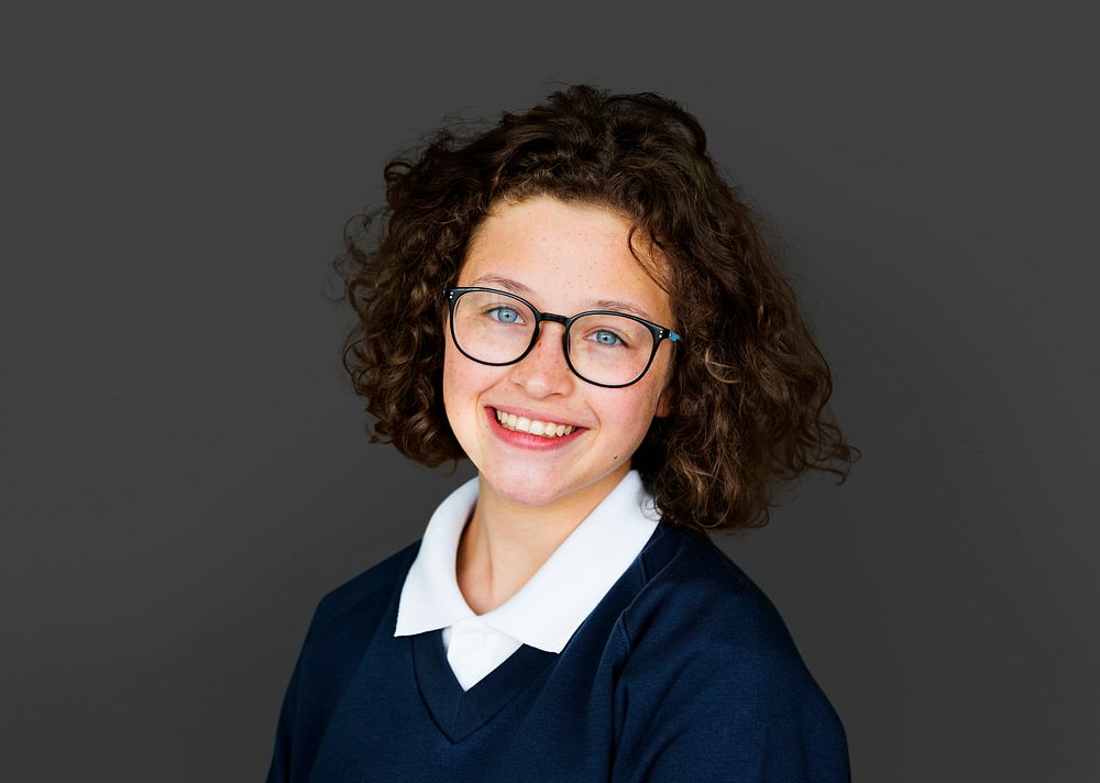 Young girl student smiling studio portrait