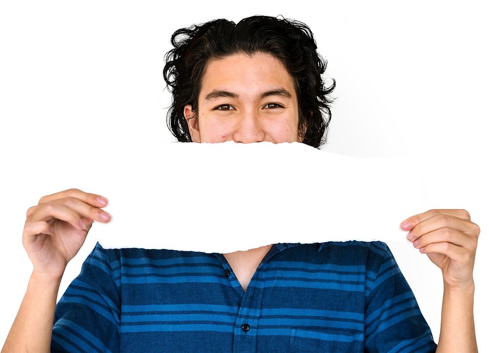 Young adult asian man holding blank paper cover his mouth