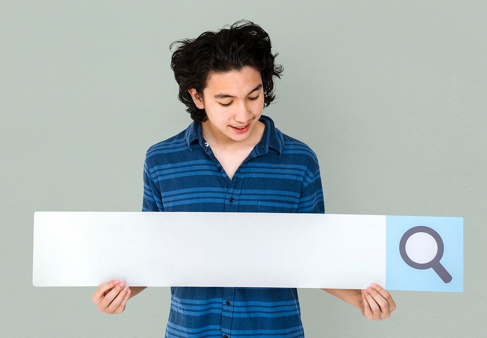 Young adult asian man holding blank searching banner