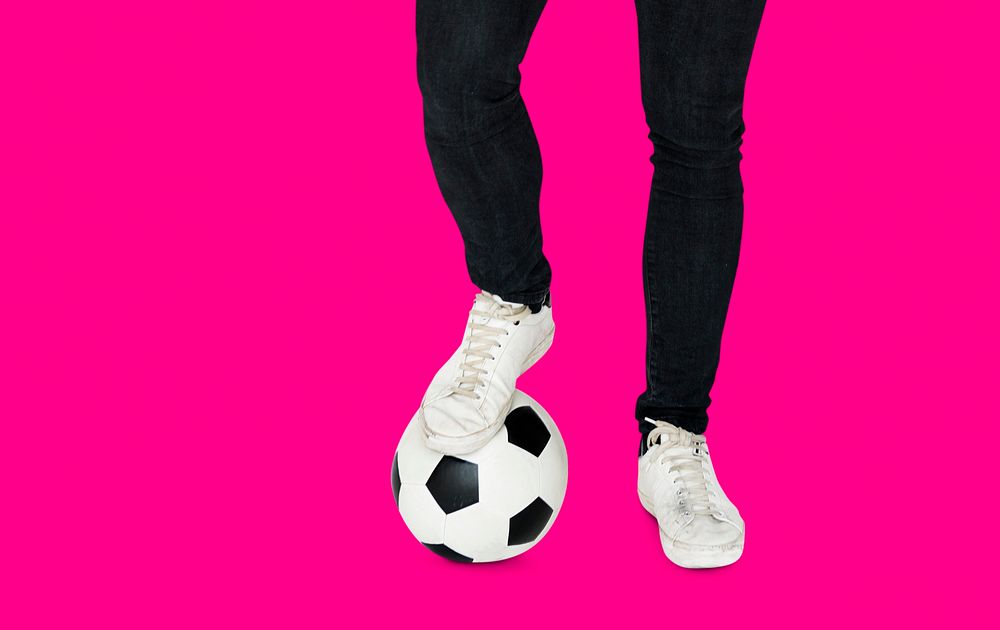 Pair of Legs with Soccer Ball Studio Portrait