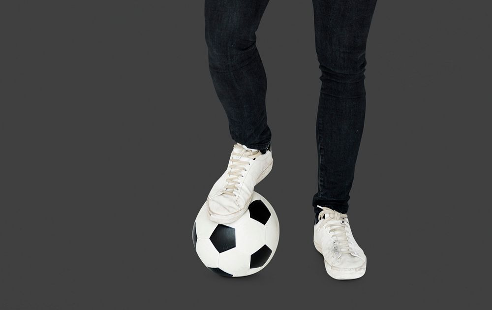 Pair of Legs with Soccer Ball Studio Portrait
