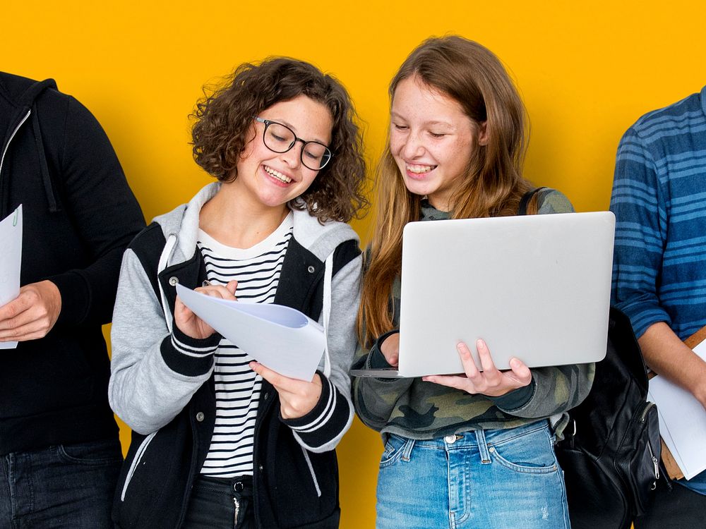 Group of Diverse High School Students Using Digital Devices Studio Portrait