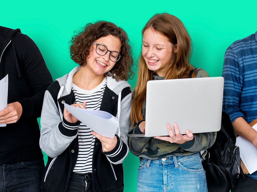 Group of Diverse High School Students Using Digital Devices Studio Portrait