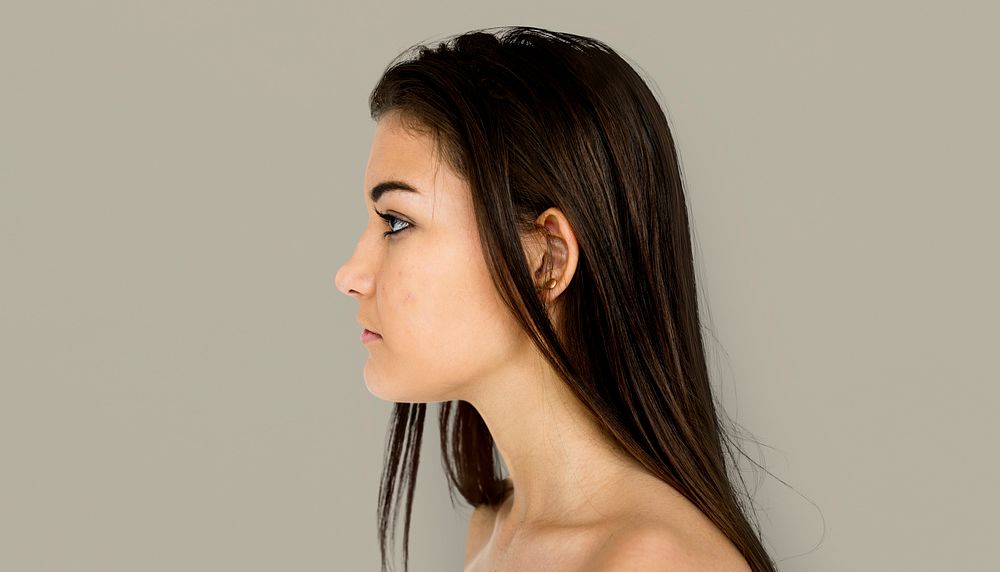 Young Adult Woman Shirtless Studio Portrait